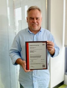 Eugene Kaspersky holding the ISO 27001