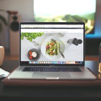 website MacBook Pro showing vegetable dish