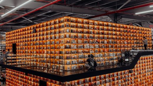 warehouse people in a building with brown cardboard boxes