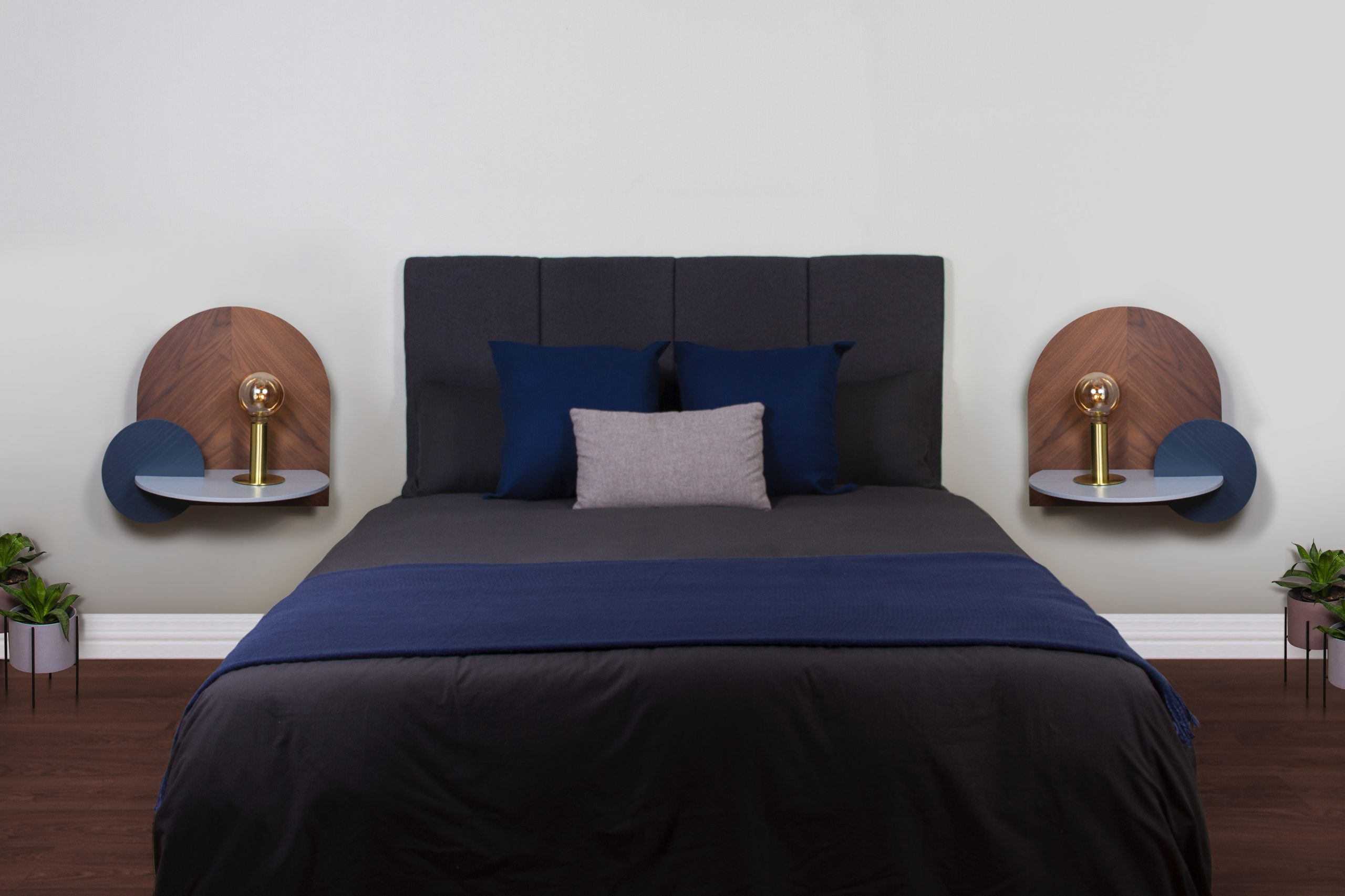 bed frame blue bed linen with pillows