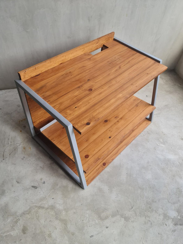 Wooden pallets donated by FedEx Express Philippines were used by Trademark Kawpeng Designs to develop this custom media console.