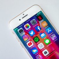 Social Media Marketing Trends turned on gold iphone 6