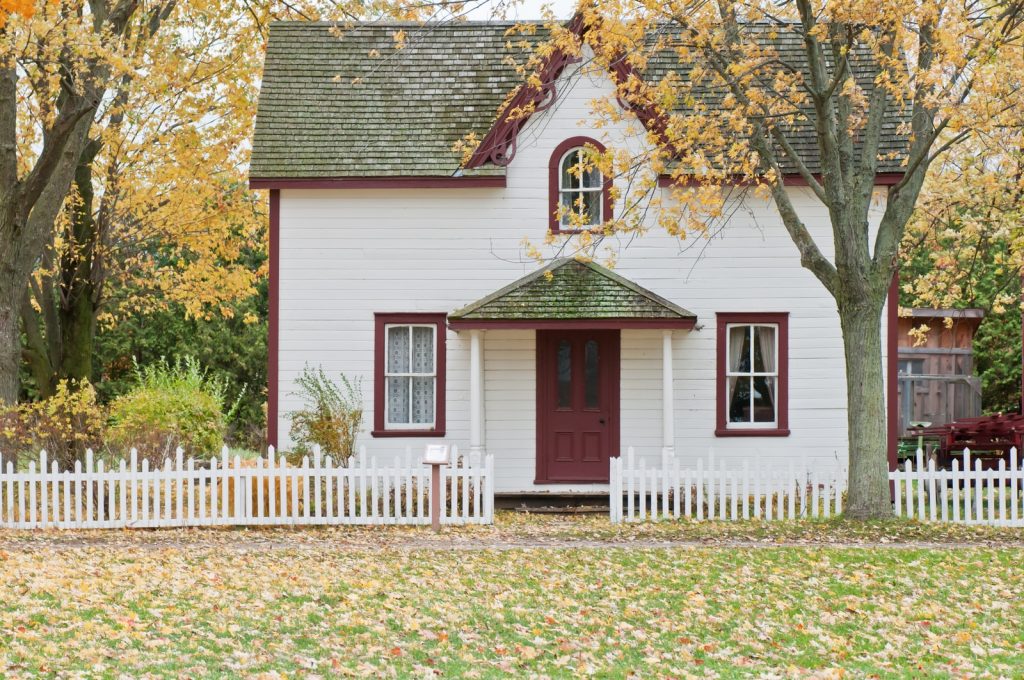 home white house under maple trees