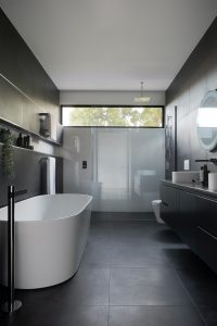 Bathroom Plumbing Glitches white ceramic bathtub near white bathtub