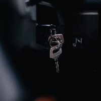 silver key on black car