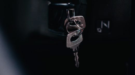 silver key on black car