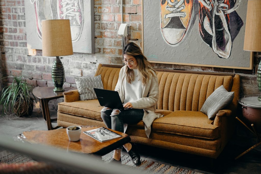 10 Ways To Make Money Using Your Computer 1 woman using laptop while sitting on chair