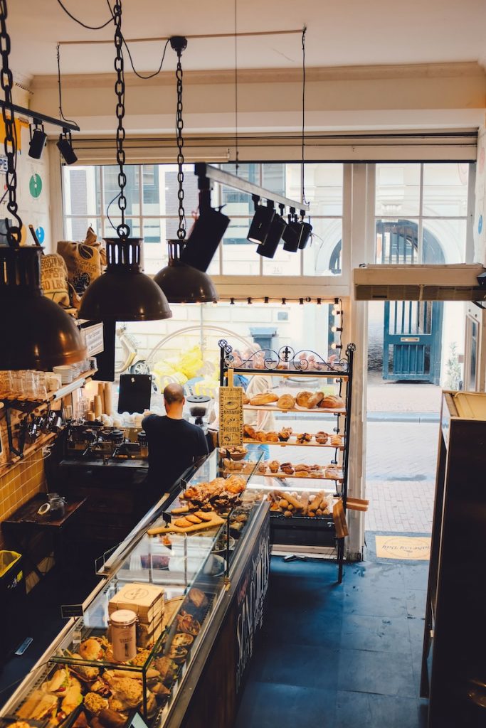 high-angle photography of bread store by day