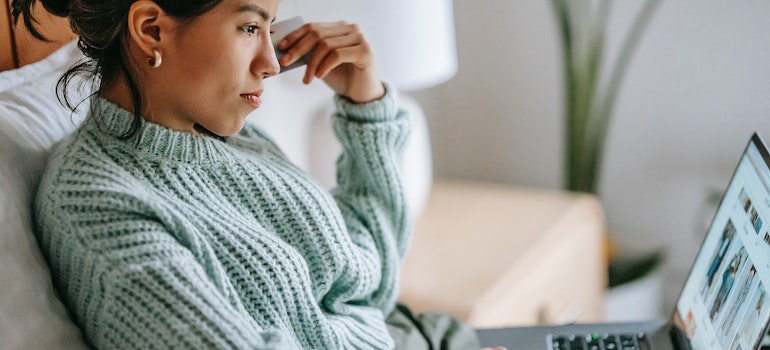 An unhappy customer looking at her screen