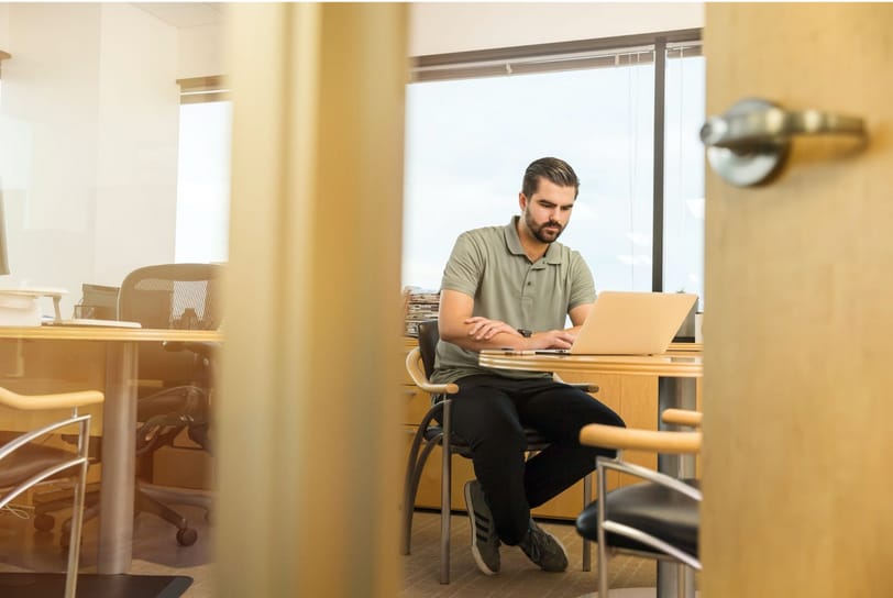How to Secure a Job in the Logistics and Supply Chain Industry 2 man with a laptop