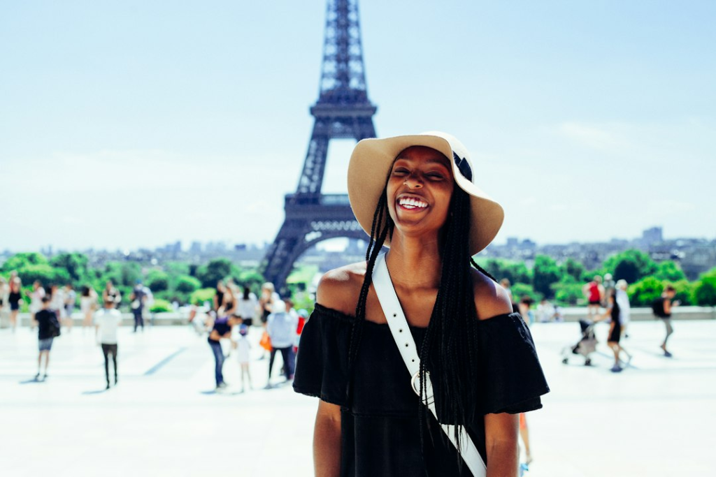 Key Things You Should Know About Taxes When Working Abroad 1 woman standing behind eiffel tower during daytime