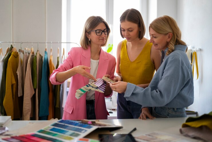 women standing in a clothing store