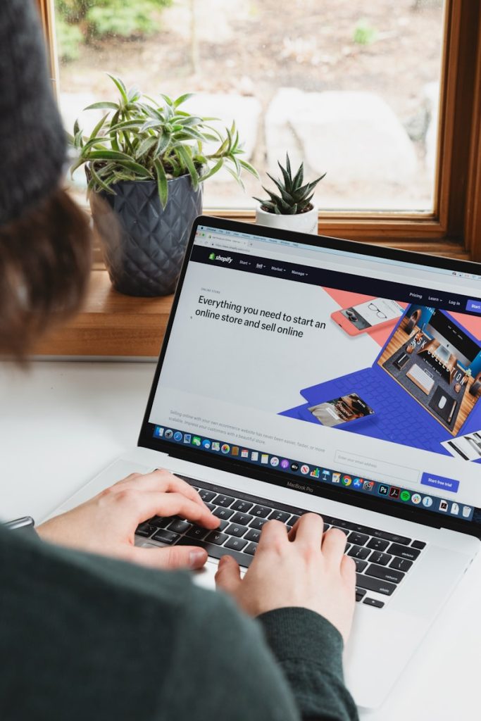 Choosing the Right E-commerce Platform: Solutions, Builders, and Software Options 1 person using macbook pro on white table
