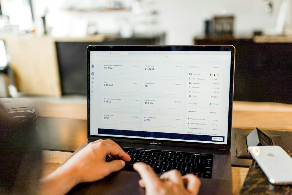 Don’t Go Broke Making These Investment Mistakes 1 person using MacBook pro