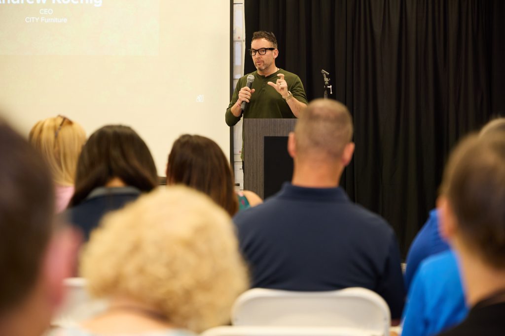 CITY Furniture's 4th Annual Green Summit Brings Together NASCAR, Local Changemakers, and Clean Energy Champions 11 City Furniture Andrew Koenig delivering opening remarks at CITY Furniture s Green Summit in Tamarac