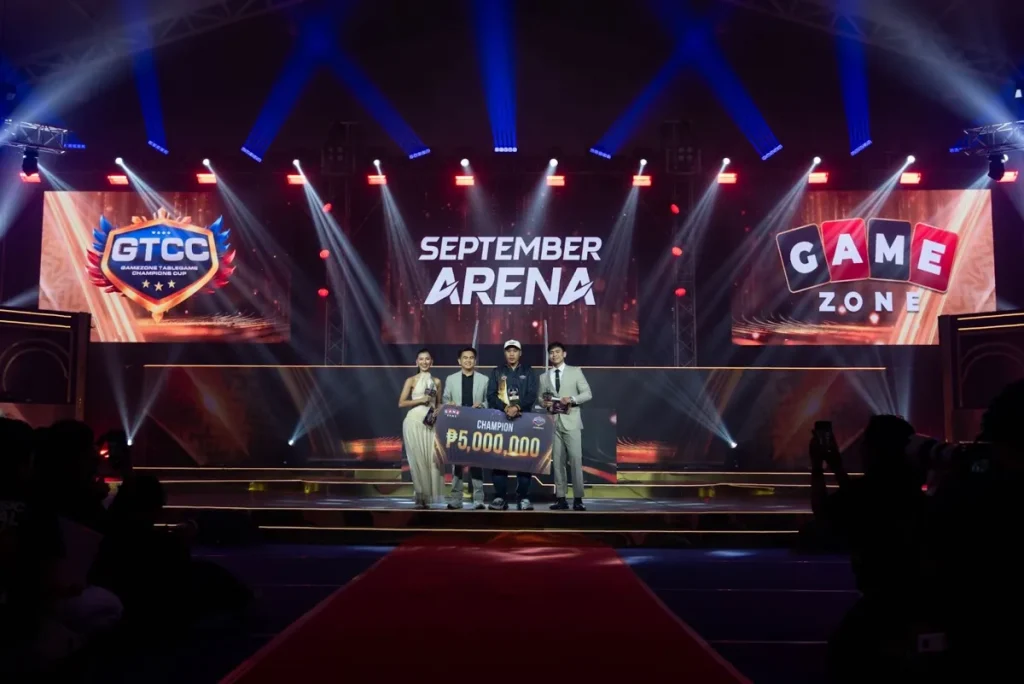 Gamemaster Integrated Inc. President, Mr. Rafael Jasper Vicencio presents the grand prize and trophy to the winner of the GTCC: September Arena