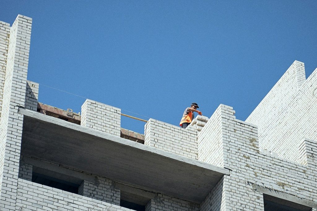 Construction Services for Modern Projects- a person on a roof