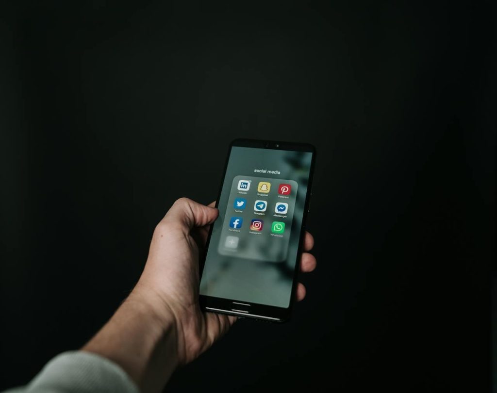 Photo of a hand holding a phone