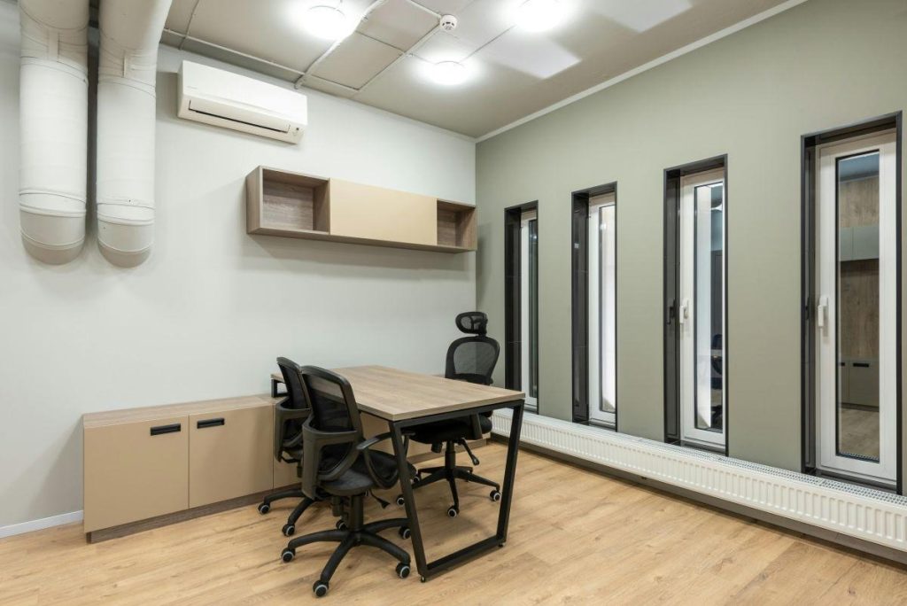 How to Time an Office Move in Ohio Around Seasonal Business Cycles (And Why It Matters) 1 An office with a wooden table and black chairs