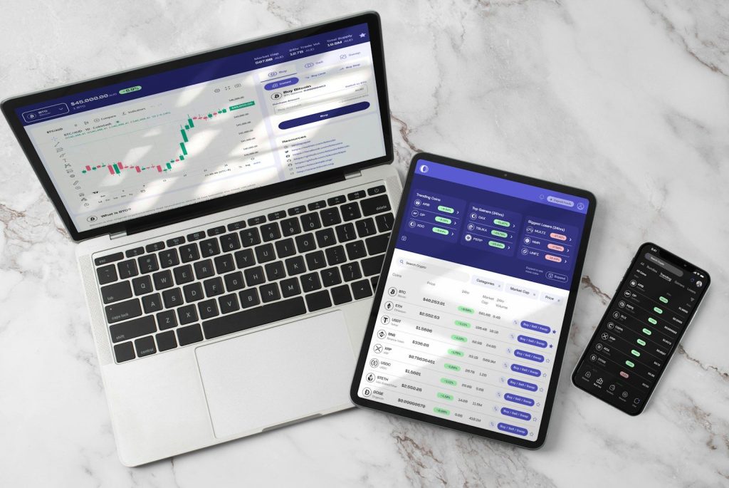 Skyro: a digital platform redefining finance 1 Two laptops and a calculator on a marble table