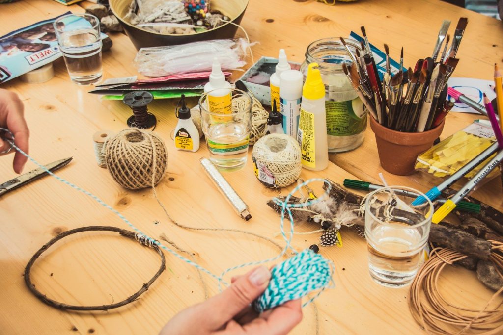Delightful Money-making Crafts You Can do at Home 1 person holding blue and white tread