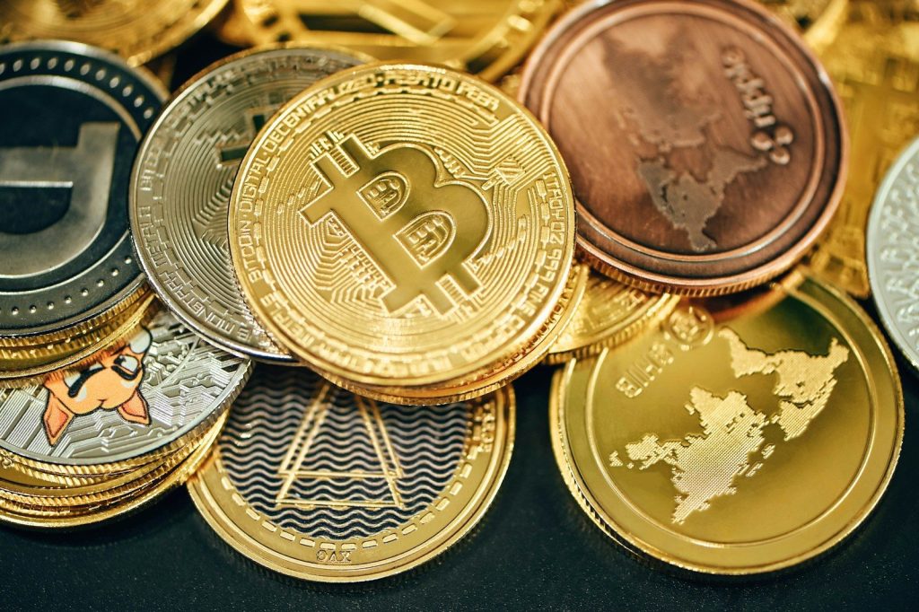 What is cryptocurrency? 6 a pile of gold and silver bitcoins